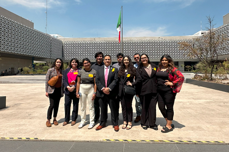 CMAS study abroad students posing for a group photo during an academic visit in Mexico