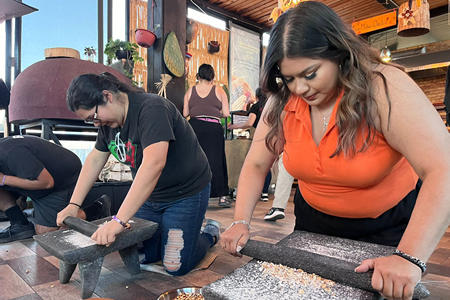 Students participating in a hands-on cultural activity during the C M A S study abroad program in Mexico
